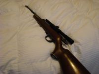 Guns & Hunting Supplies Remington 22 with scope, model 525