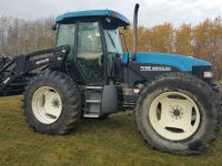 Tractors TV 140 tractor  and loader. haybine header